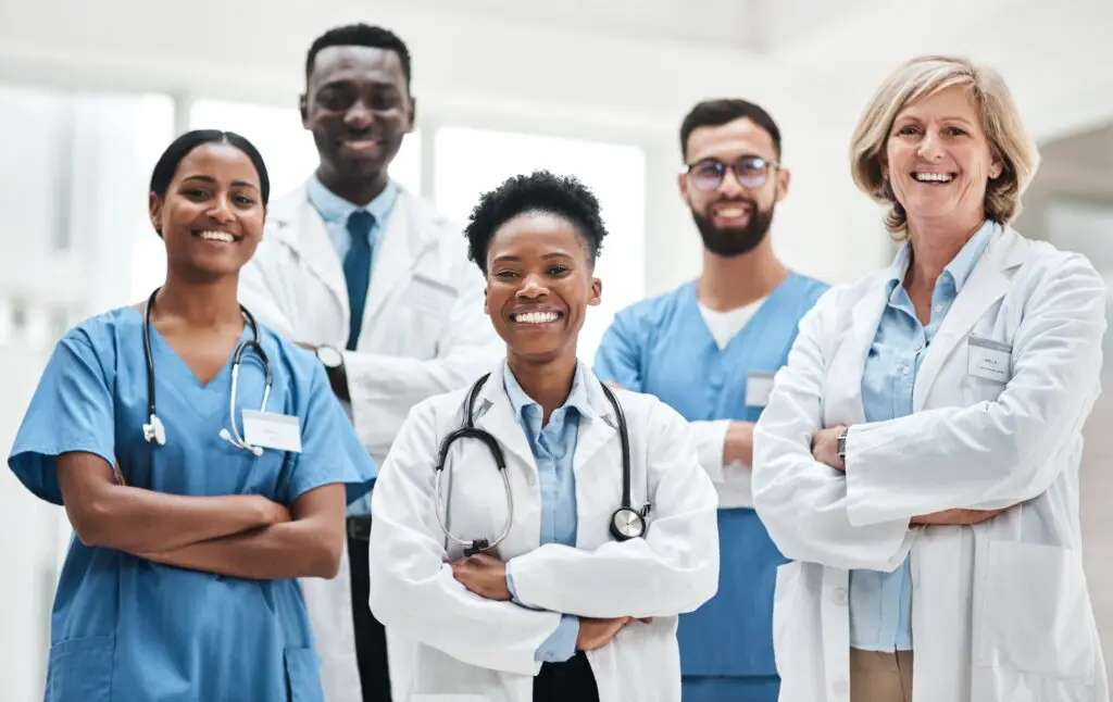 A group of doctors standing in front of each other.
