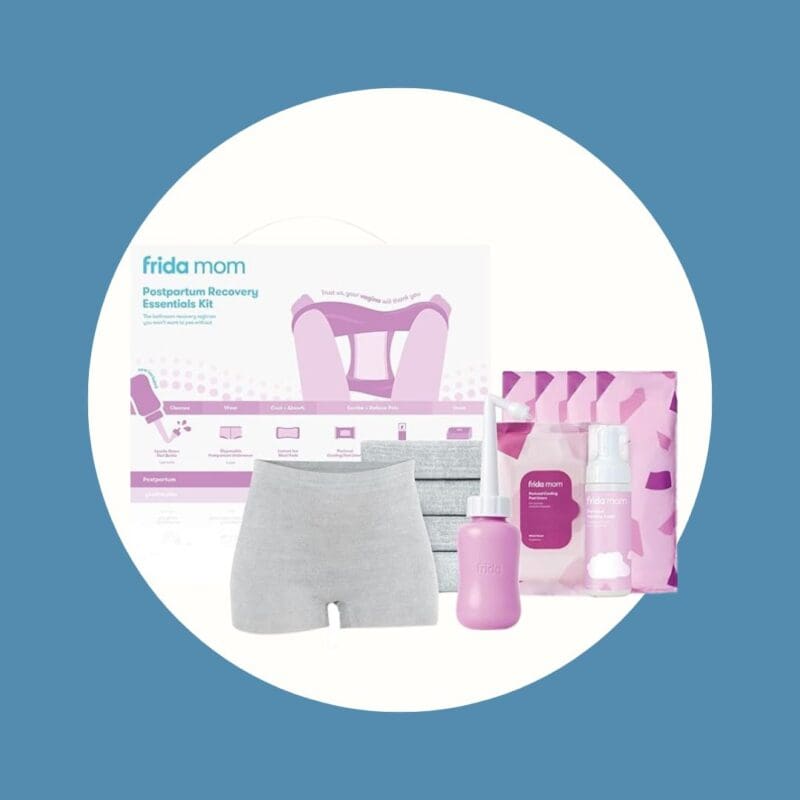 white and pink postpartum recovery kit next to grey underwear and a pink squirt bottle