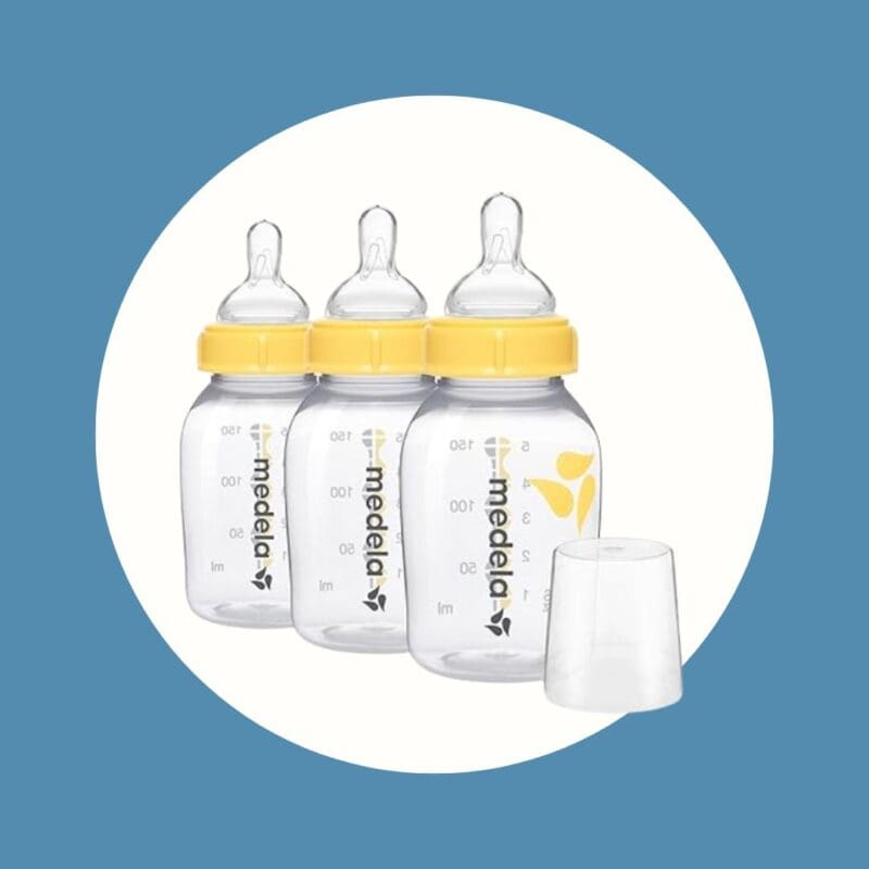 three empty medela bottles with nipples