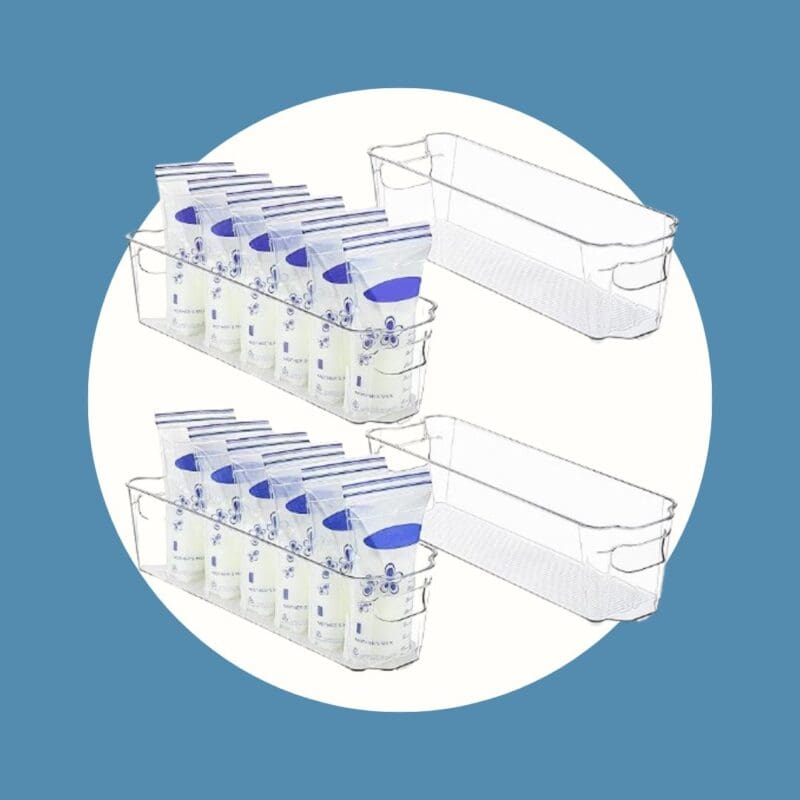 clear rectangular containers holding bags of breastmilk