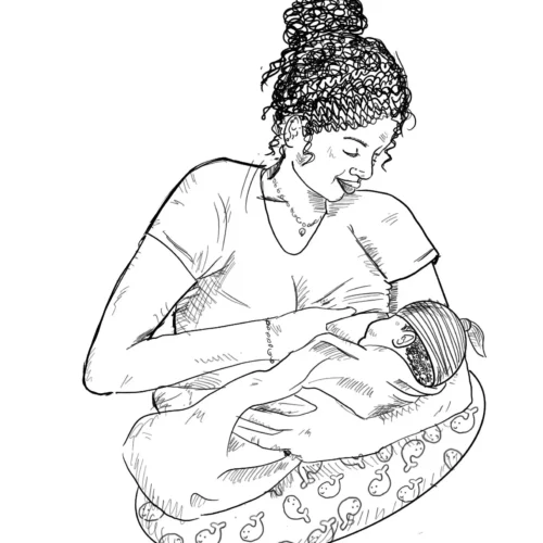 A woman holding her baby in her arms.