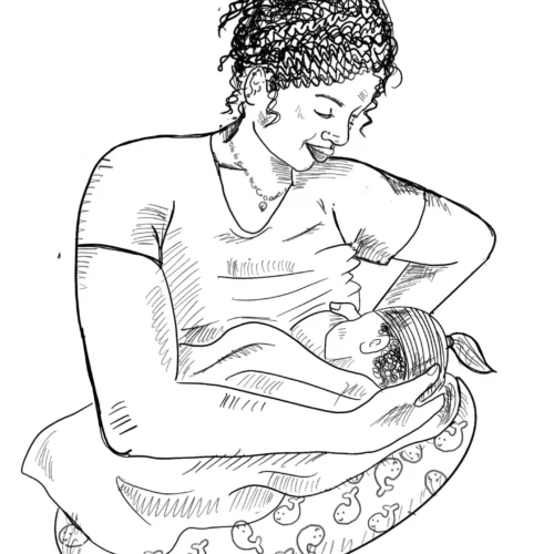 A woman holding her baby in her arms.